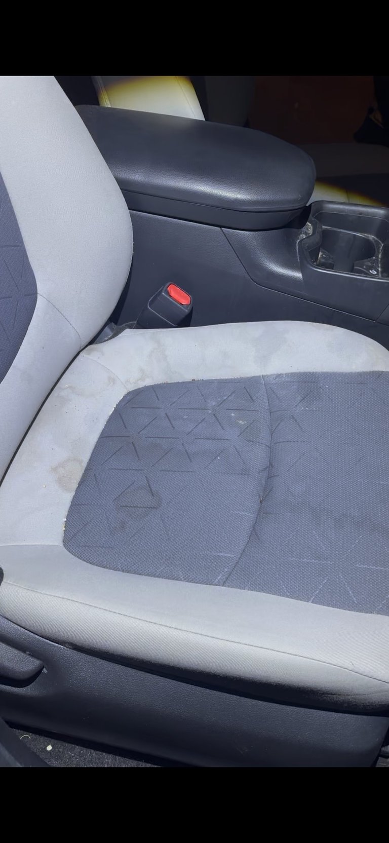 Car interior passenger seat before detailing